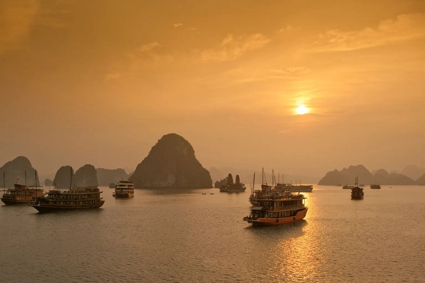 sunrise in Ha Long Bay A cruise in Ha Long Bay provides an unforgettable sunrise-watching experience