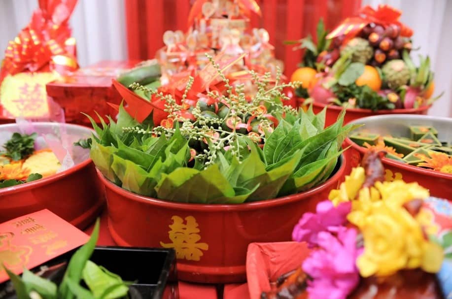 Vietnamese wedding tea ceremony The red trays reflect tradition and grace