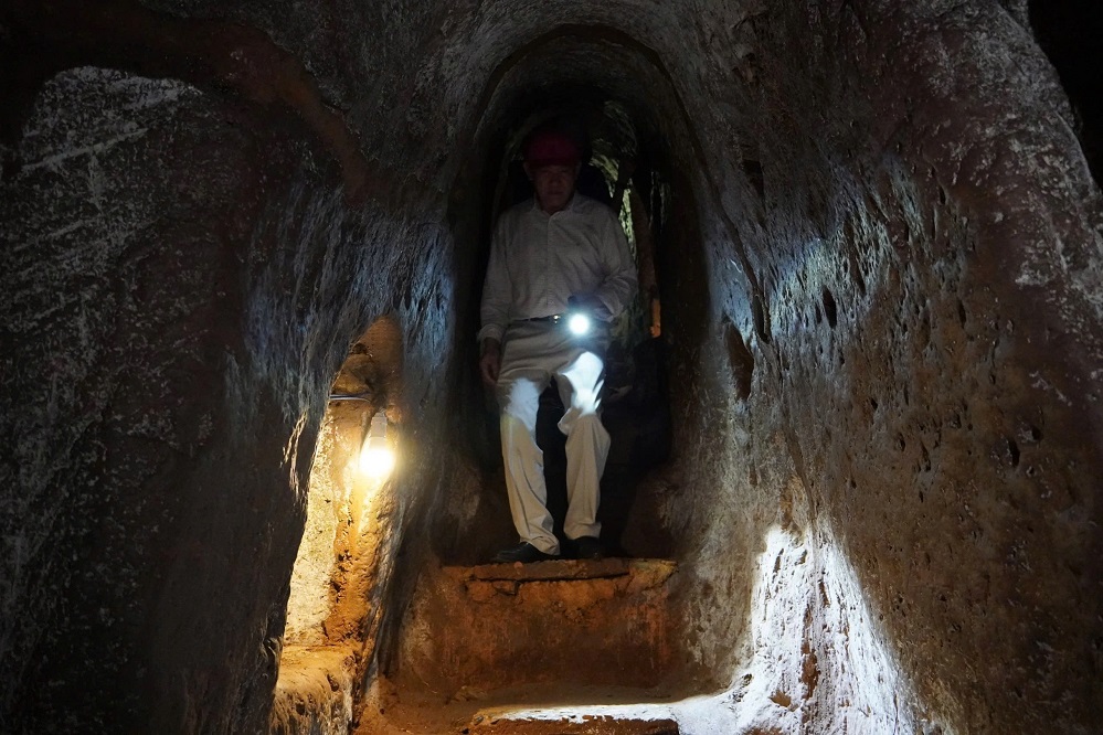 Tourist exploring Vinh Moc Tunnels