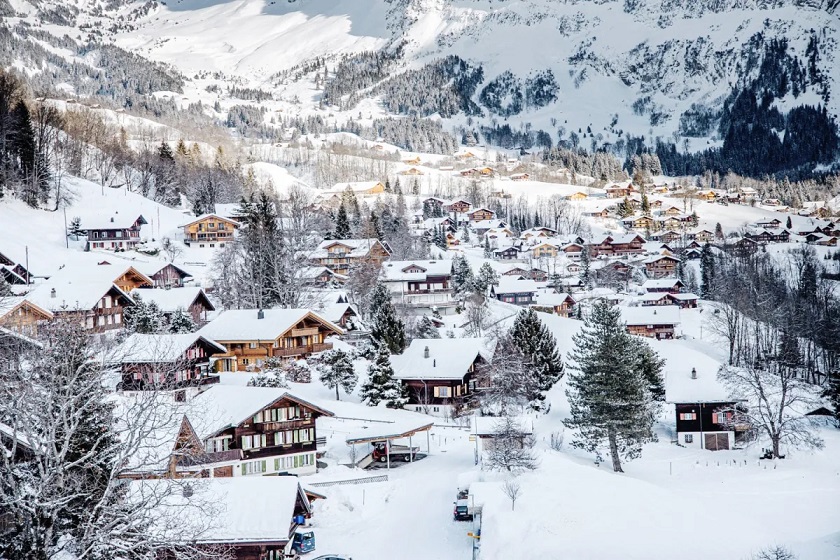 Safest countries to visit with family snow draped Alps in Switzerland
