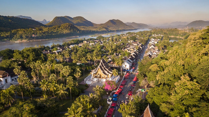 Luang Prabang’s temple rooftops and misty hills