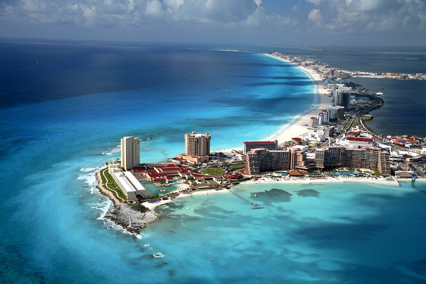 best places to visit in December outside the US Cancún Beach is one of the best places to travel outside the US in December