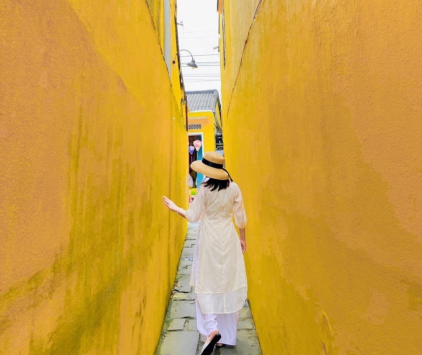 Check in at the yellow wall in Hoi An