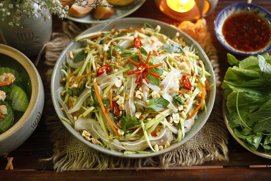 Vietnamese mango salad with boiled pork rind