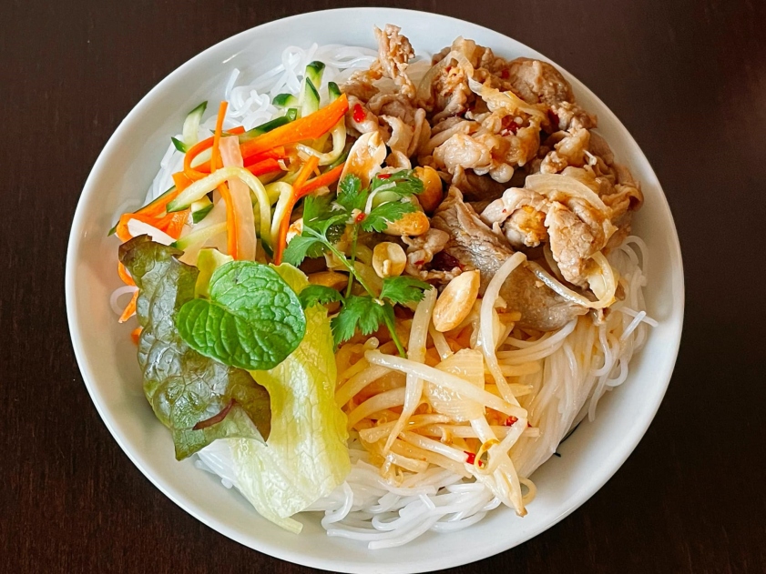Stir-fried lemongrass beef over noodles