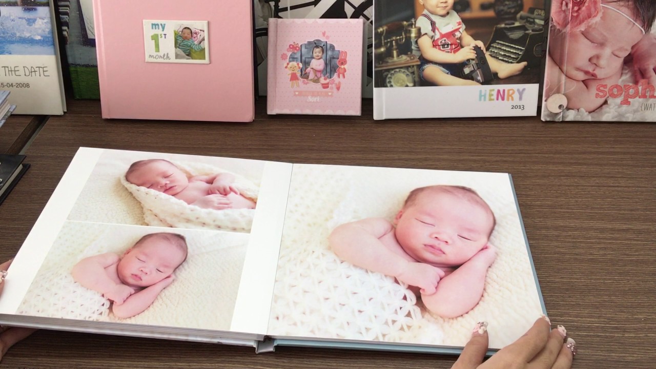 quà sinh nhật cho bé gái Một cuốn album chứa đựng nhiều ảnh kỉ niệm của bé