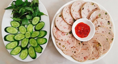 Vietnamese sausage (gio lua): An exquisite dish wrapped in banana leaves